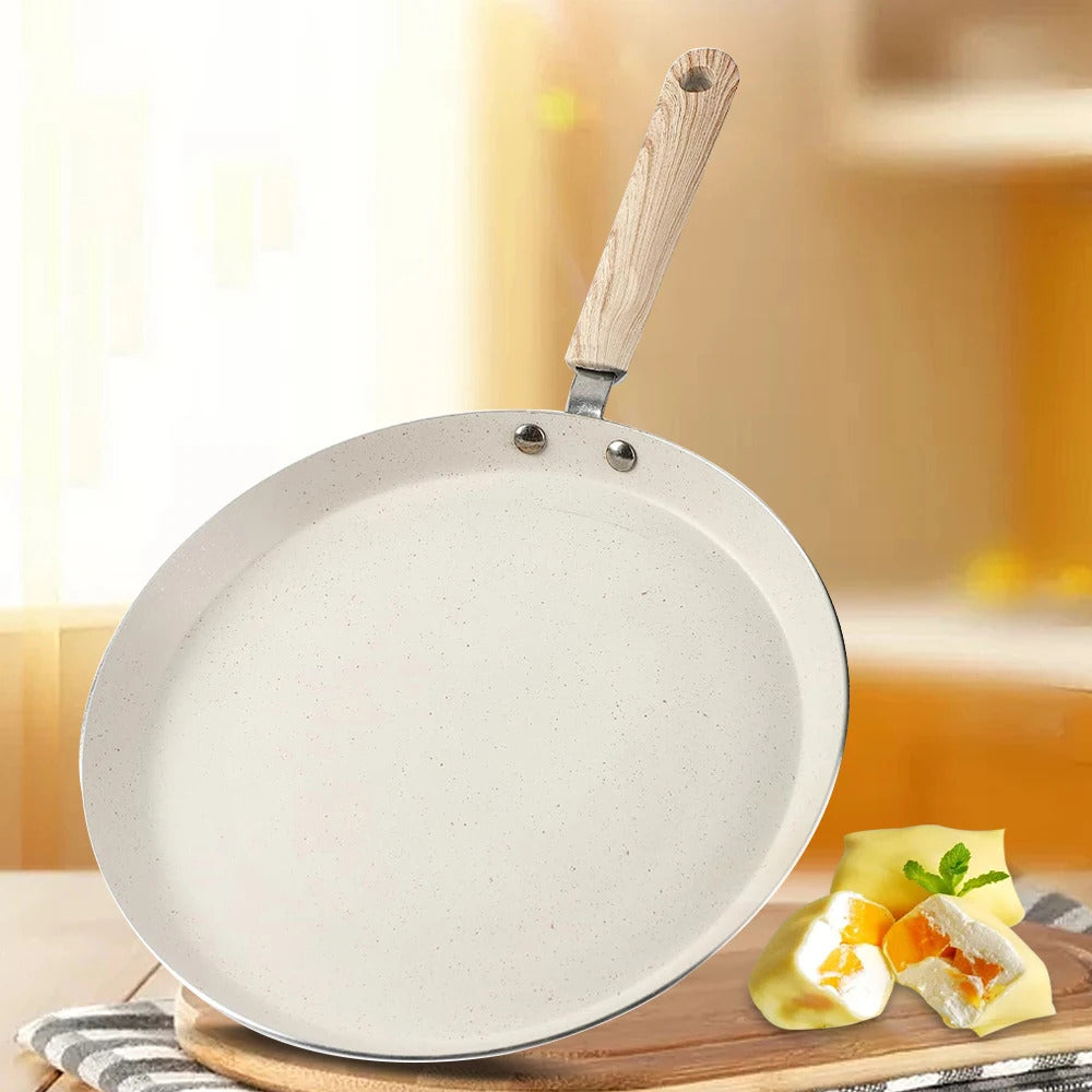 Poele à Crepe Antiadhésive Design et Élégante, sur un fond orangé.
